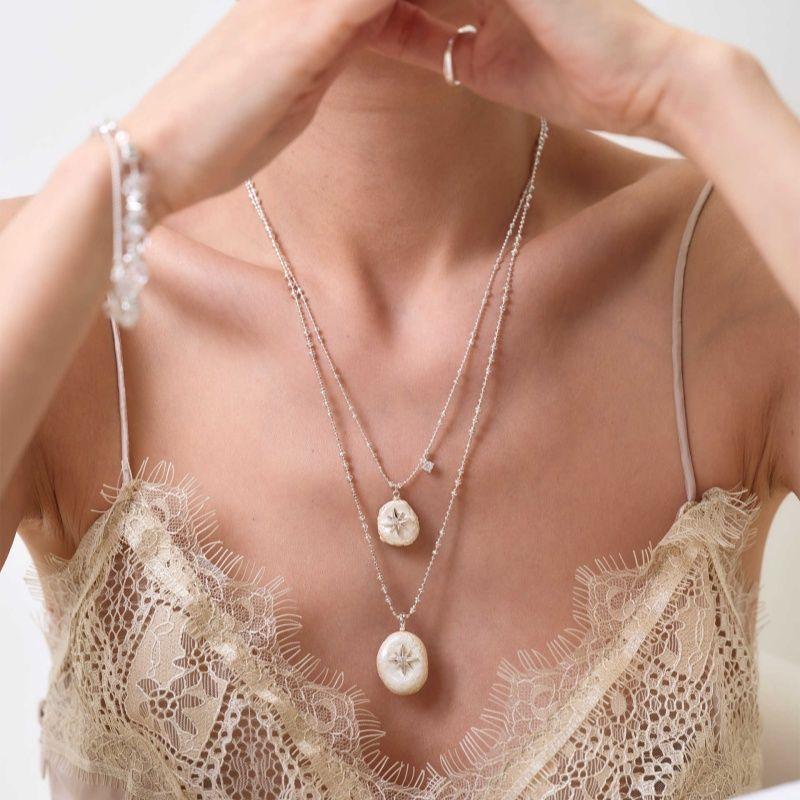 Elegant Stylish And Sophisticated Long Pendant Starburst Necklace For Women