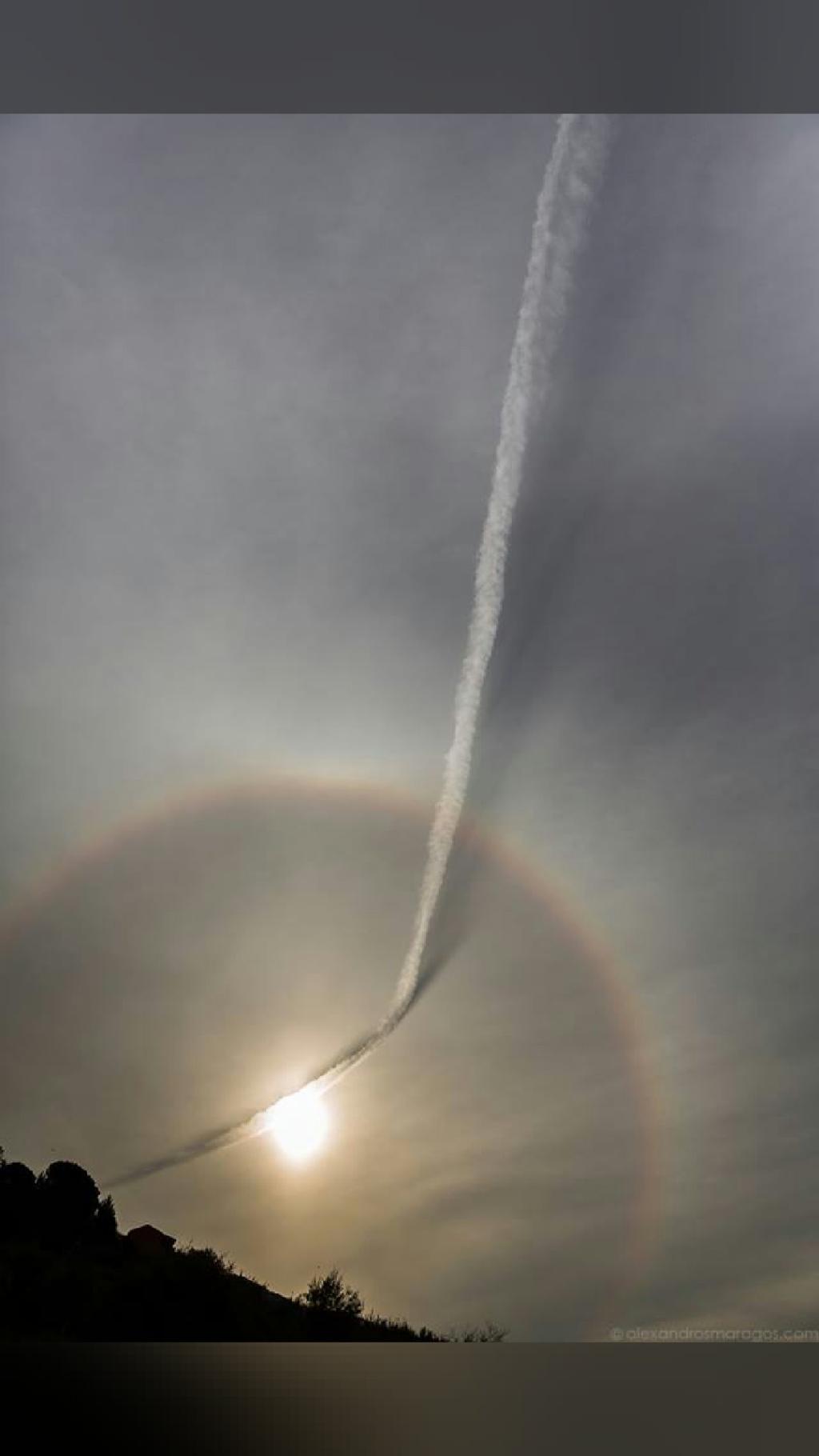 we are so small Plane Contrail and Sun Halo What's happened to the…