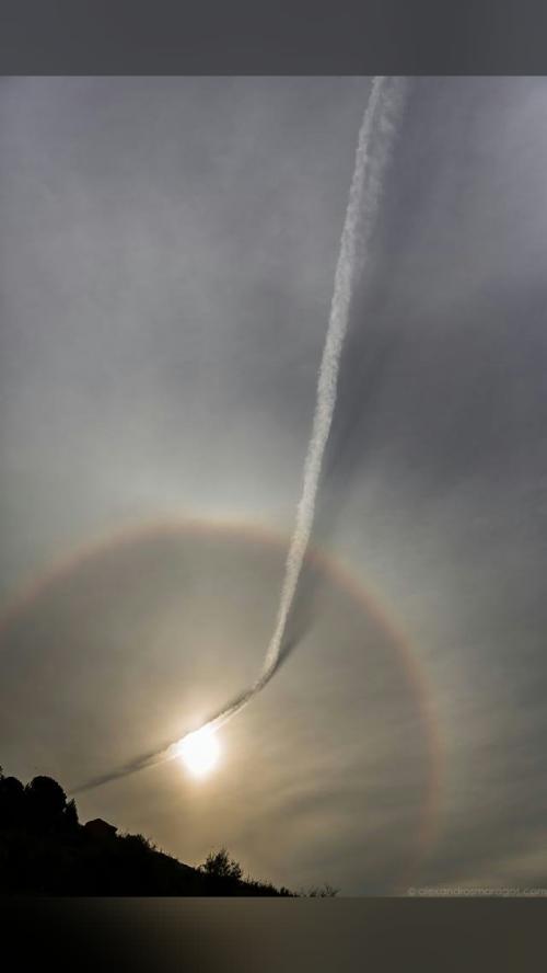 we are so small Plane Contrail and Sun Halo What's happened to the…